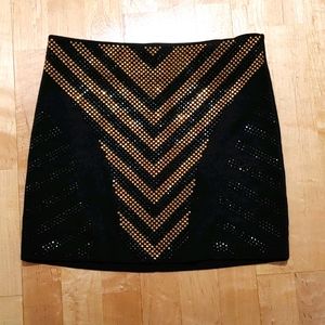 Black and gold mini skirt